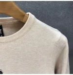 Pull vintage homme avec design artistique