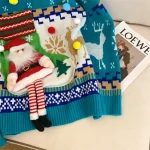 Pull de Noël festif avec motifs Père Noël en relief